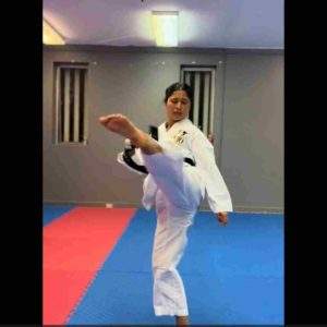 Master Chandu showing her round house kick