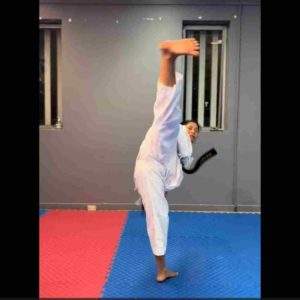 Master Chandu showing her super high side kick technique