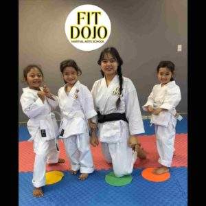 Master Su group photo with her young karate martial arts students